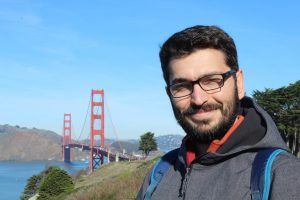 Photo of Dr. Burak Yuksek with the Golden Gate Bridge, San Francisco in the background