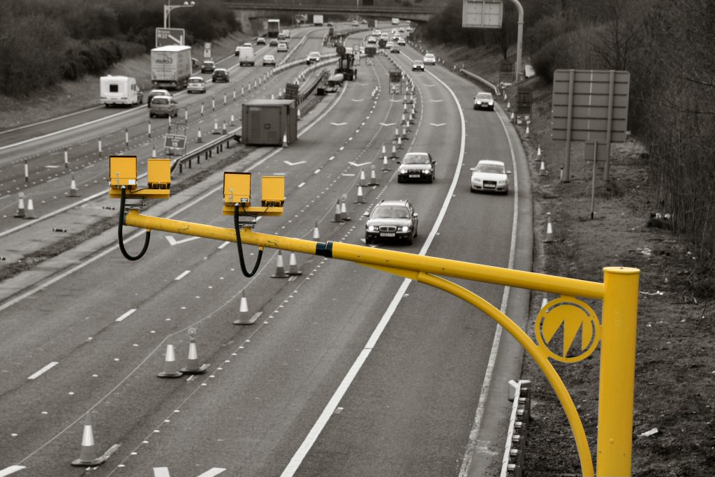 A photo of a motorway showing speed cameras in postition