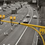 A photo of a motorway showing speed cameras in postition