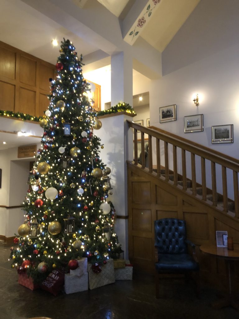 A large decorated Christmas tree in the Lancaster House Hotel