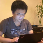 Researcher Zhuangkun Wei working hard on a laptop